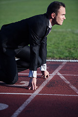 Image showing business man ready to sprint