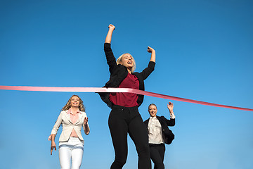 Image showing business people running on racing track