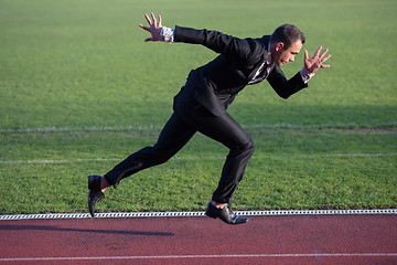 Image showing business man ready to sprint