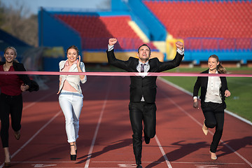 Image showing business people running on racing track