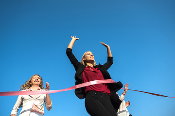 Image showing business people running on racing track