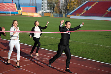 Image showing business people running on racing track