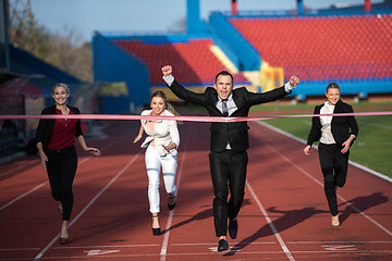 Image showing business people running on racing track