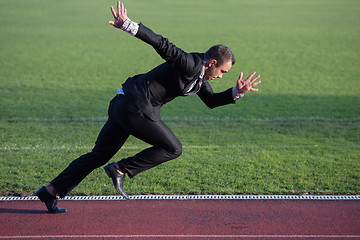 Image showing business man ready to sprint