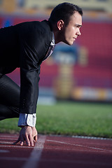 Image showing business man ready to sprint