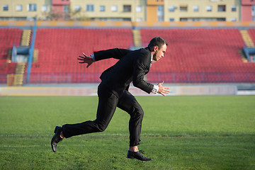 Image showing business man ready to sprint