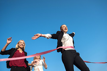 Image showing business people running on racing track