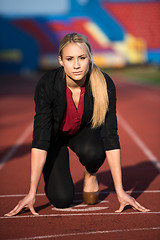 Image showing business woman ready to sprint