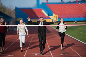 Image showing business people running on racing track