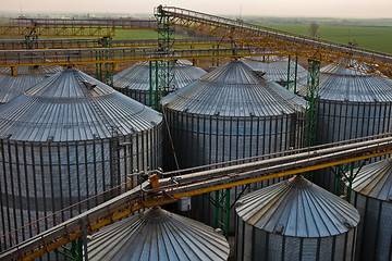 Image showing Towers of grain drying enterprise at sunny day