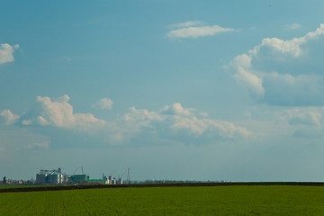 Image showing Towers of grain drying enterprise at sunny day