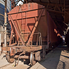 Image showing Freight train with hopper cars.