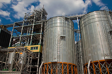 Image showing Towers of grain drying enterprise at sunny day