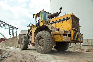 Image showing Bulldozer on sand