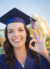 Image showing Happy Graduating Mixed Race Woman In Cap and Gown