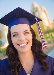 Image showing Happy Graduating Mixed Race Woman In Cap and Gown