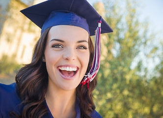 Image showing Happy Graduating Mixed Race Woman In Cap and Gown