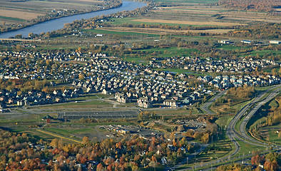 Image showing Aerial view of town and highway