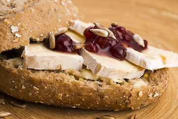 Image showing bread served with camembert and cranberry