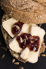 Image showing bread served with camembert and cranberry