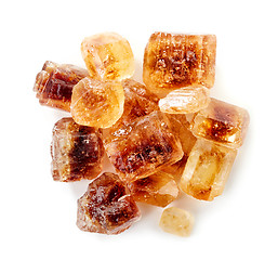 Image showing Brown caramelized sugar cubes on a white background 