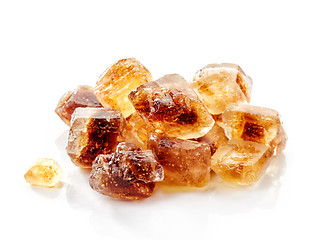 Image showing Brown caramelized sugar cubes on a white background 