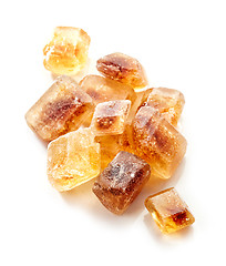 Image showing Brown caramelized sugar cubes on a white background 