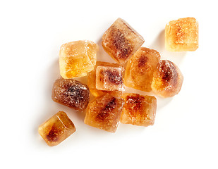 Image showing Brown caramelized sugar cubes on a white background 