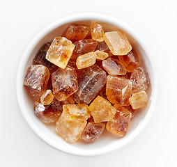 Image showing Brown caramelized sugar cubes on a white background 