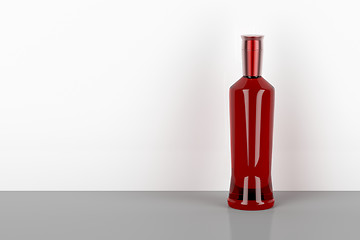 Image showing Red alcohol bottle