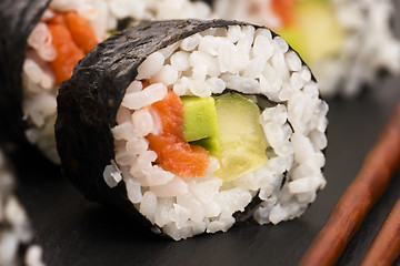 Image showing Salmon rolls served on a plate