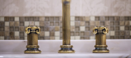 Image showing golden faucet 