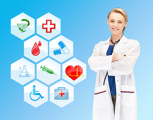 Image showing smiling doctor over medical icons blue background