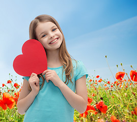 Image showing smiling little girl with red heart