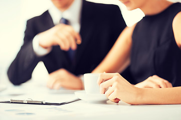 Image showing woman hand signing contract paper