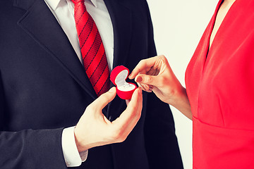 Image showing couple with wedding ring and gift box