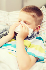 Image showing ill boy with flu at home