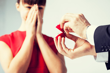 Image showing couple with wedding ring and gift box