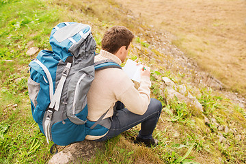 Image showing man with backpack hiking