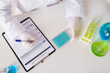 Image showing close up of scientist making test in lab