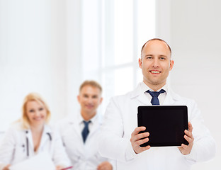 Image showing smiling male doctor with tablet pc