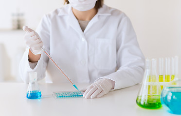 Image showing close up of scientist making test in lab