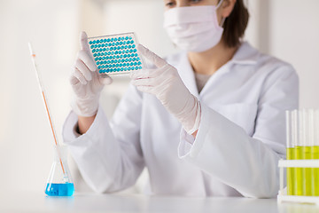 Image showing close up of scientist making test in lab