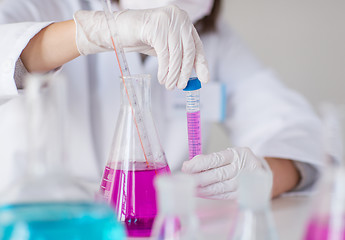 Image showing close up of scientist making test in lab