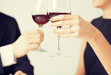 Image showing engaged couple with wine glasses