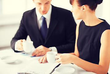 Image showing woman hand signing contract paper