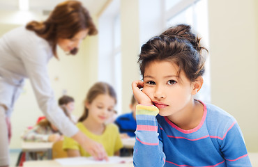 Image showing sad or bored little school girl