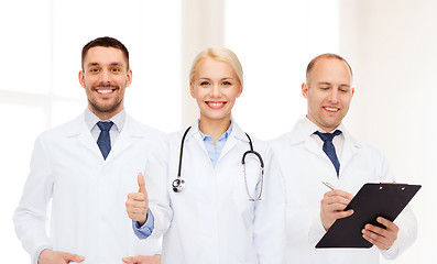 Image showing group of doctors showing thumbs up in clinic