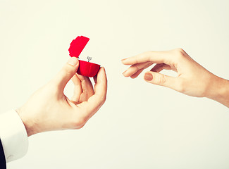 Image showing couple with wedding ring and gift box