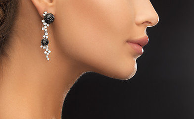 Image showing woman wearing shiny diamond earrings